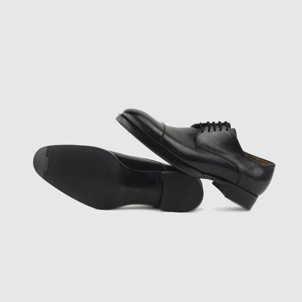 CARY Service Gummibesohlung auf genähten Lederschuhen